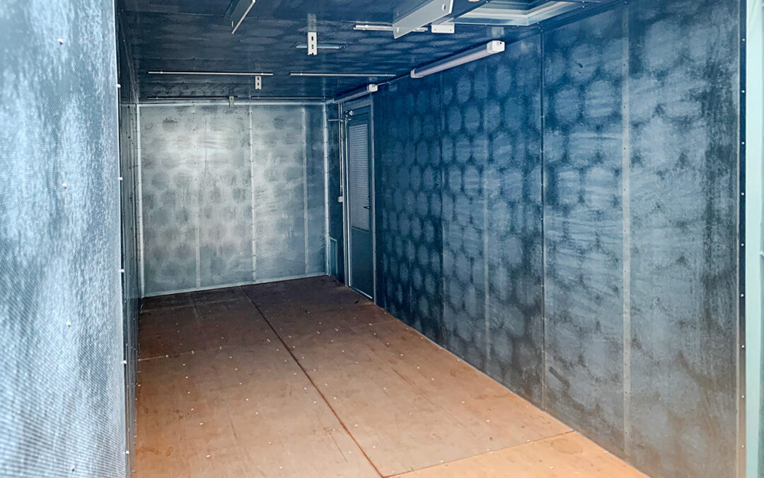 Custom-built container with noise reducing insulation